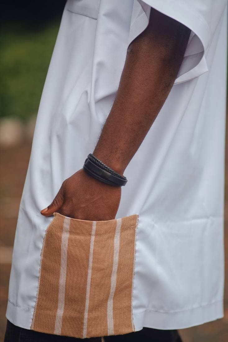 Tan aso-oke pocket detail