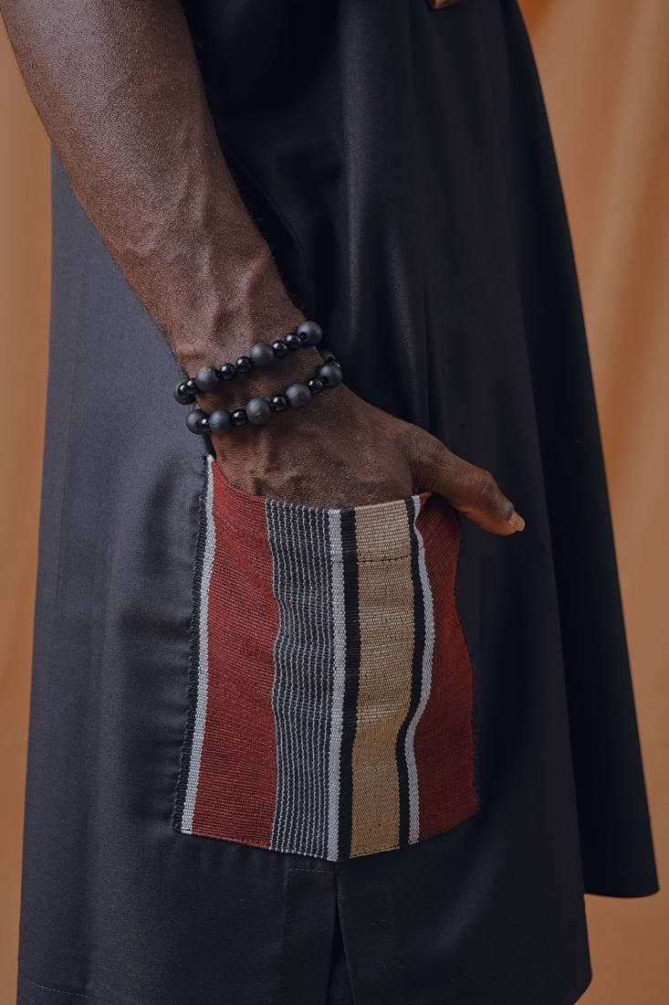 Striped aso-oke pocket detail