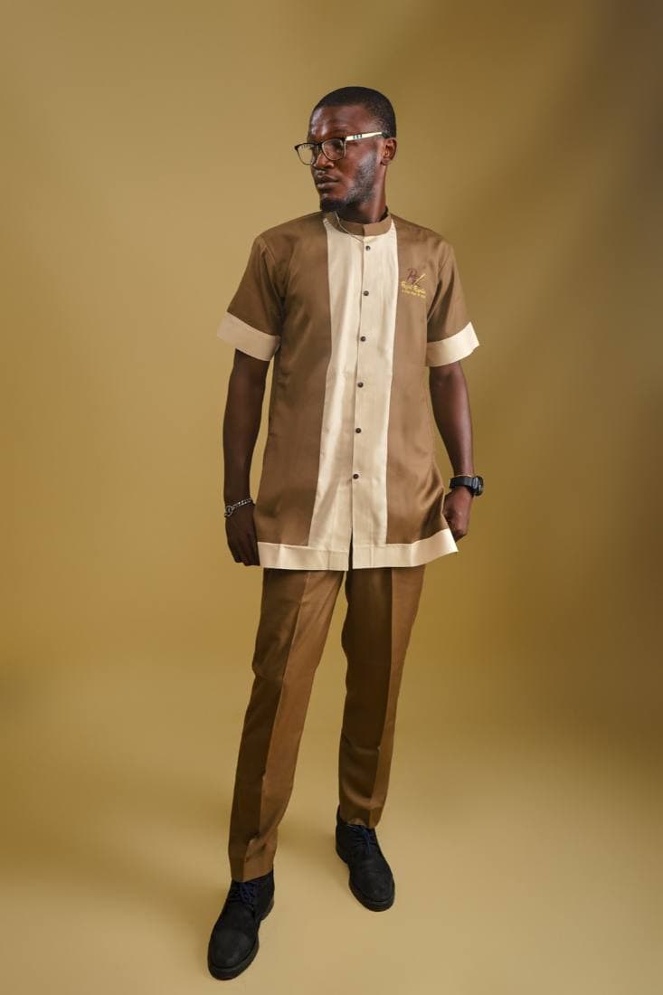 Man in a brown and cream two-tone senator set