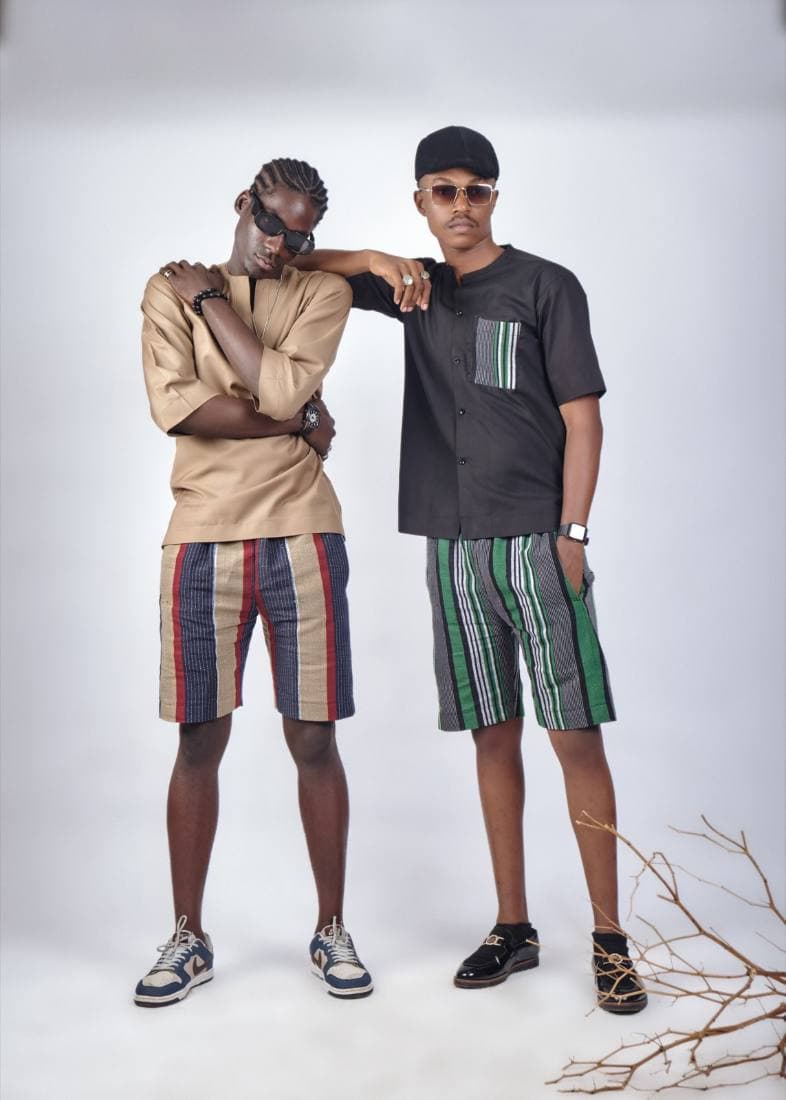 Two men in aso-oke woven shorts sets